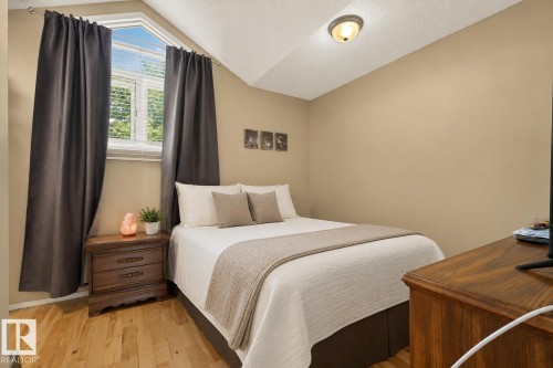 Room featuring a distinctive vaulted ceiling and an angled window with horizontal blinds - 9 Emerald Terrace, St. Albert, AB 
