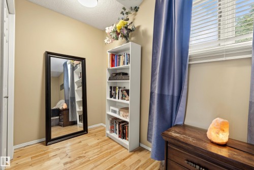 Hardwood-finish flooring complementing neutral-toned walls - 9 Emerald Terrace, St. Albert, AB 