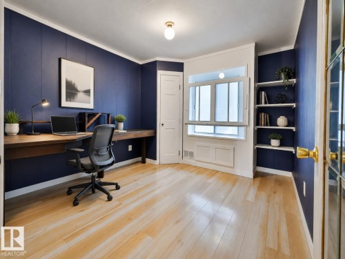 Bright interior space featuring light wood flooring - 8318 80 Avenue, Edmonton, AB 