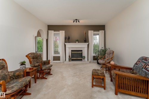 520 Pardee Bay, Edmonton, AB - Indoor Photo Showing Living Room With Fireplace