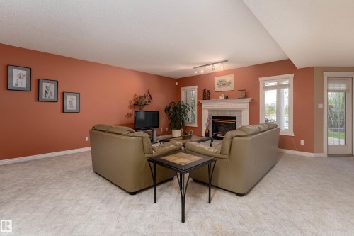 520 Pardee Bay, Edmonton, AB - Indoor Photo Showing Living Room With Fireplace