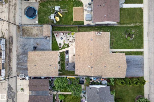 Aerial perspective showcasing two distinct residential properties - 10935 152 Street, Edmonton, AB 