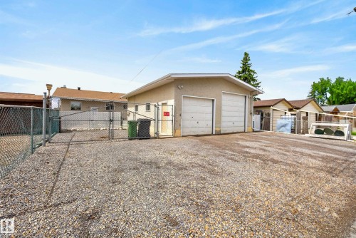 Two-car detached garage with stucco exterior and dual overhead doors - 10935 152 Street, Edmonton, AB 