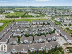 Expansive community featuring multi-unit residential buildings - 