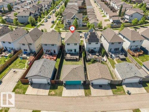 Aerial perspective showcasing a residential property with a detached rear garage - 3511 15A Street, Edmonton, AB 