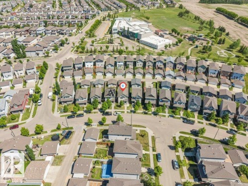 Aerial perspective showcasing a residential neighborhood with numerous detached homes - 3511 15A Street, Edmonton, AB 