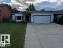 White siding exterior with a prominent bay window - 3718 103B Street, Edmonton, AB 
