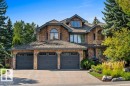 Paving stone driveway and reclaimed brick exterior. - 738 Wheeler Road, Edmonton, AB 