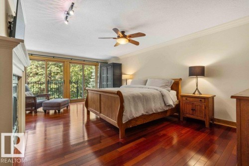 Master bedroom featuring Brazilian Cherry wood floor   and gas fireplace. - 738 Wheeler Road, Edmonton, AB 