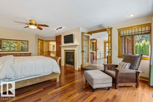 Master bedroom featuring Brazilian Cherry wood floor   and gas fireplace. - 738 Wheeler Road, Edmonton, AB 