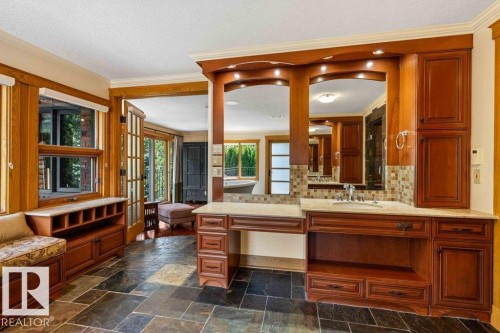 Master ensuite with heated slate flooring, steam shower, Grohe taps throughout, hydronic heated towel bar and air jetted tub. - 738 Wheeler Road, Edmonton, AB 