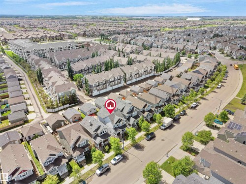 Residential property situated within a developed neighborhood featuring detached homes and multi-unit residences - 7827 22 Avenue, Edmonton, AB 
