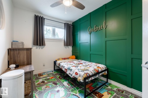 Accent wall featuring board and batten paneling - 27 Danforth Crescent, St. Albert, AB 