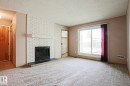 203 44 Alpine Place, St. Albert, AB  - Indoor Photo Showing Living Room With Fireplace 