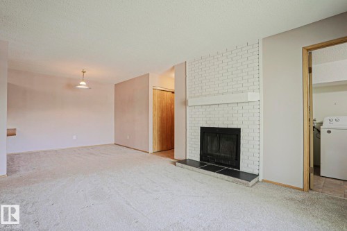 203 44 Alpine Place, St. Albert, AB - Indoor With Fireplace