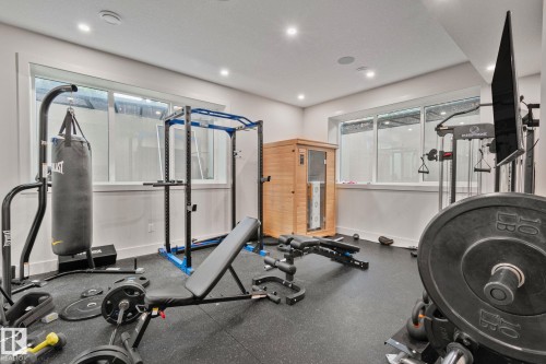 Dedicated fitness area featuring durable rubber flooring - 4509 Wingfield Bay Bay, Edmonton, AB 