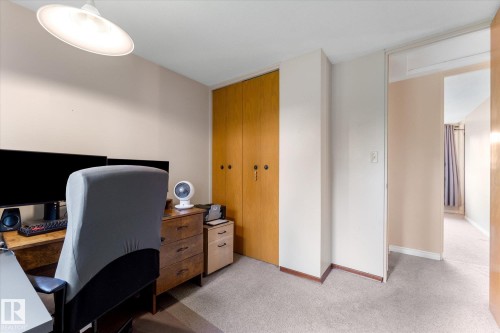 Neutral-toned walls and light-colored carpeting define this room - 15112 76A Avenue, Edmonton, AB 