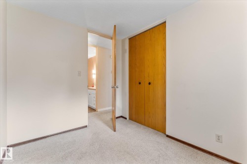 Neutral-toned walls complement light-colored carpeting - 15112 76A Avenue, Edmonton, AB 