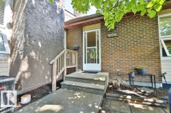 Front entryway with concrete steps and a white storm door - 