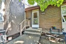 Front entryway with concrete steps and a white storm door - 17009 109 Street, Edmonton, AB 