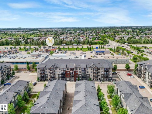 Multi-story residential building featuring balconies and a mix of exterior finishes - 406 9519 160 Avenue, Edmonton, AB 