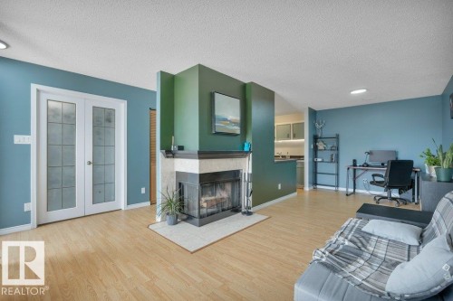 2336 151 Avenue, Edmonton, AB - Indoor Photo Showing Living Room With Fireplace