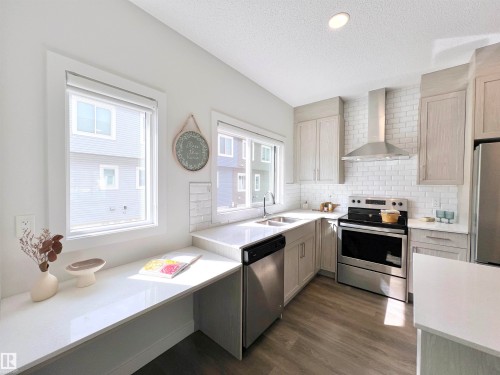 6 11373 12 Avenue, Edmonton, AB - Indoor Photo Showing Kitchen With Double Sink