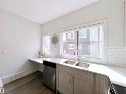 6 11373 12 Avenue, Edmonton, AB - Indoor Photo Showing Kitchen With Double Sink