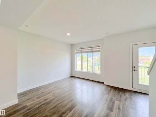 6 11373 12 Avenue, Edmonton, AB - Indoor Photo Showing Other Room