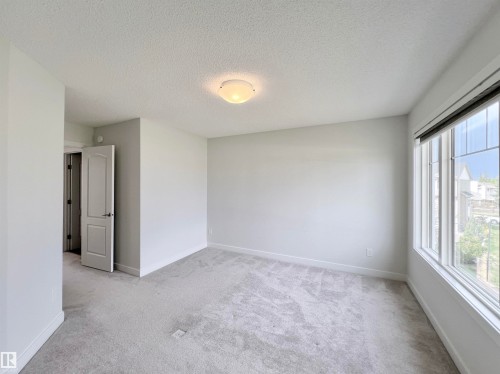 6 11373 12 Avenue, Edmonton, AB - Indoor Photo Showing Other Room