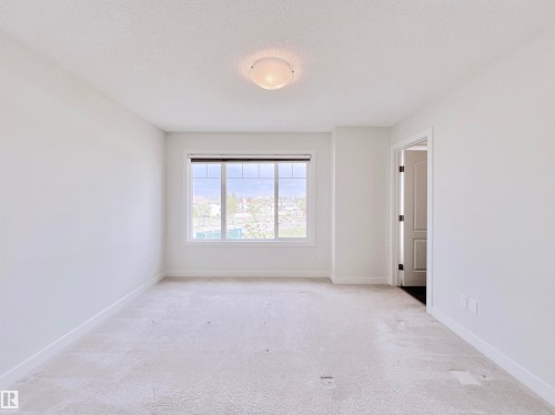 6 11373 12 Avenue, Edmonton, AB - Indoor Photo Showing Other Room
