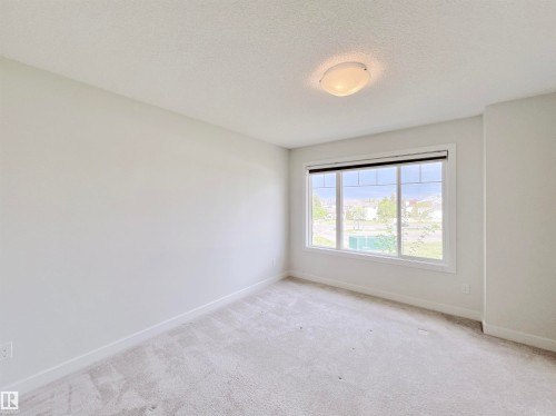 6 11373 12 Avenue, Edmonton, AB - Indoor Photo Showing Other Room