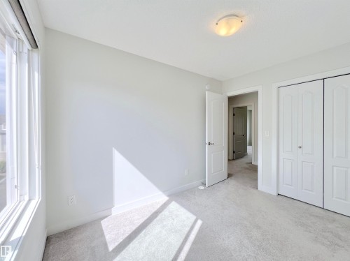 6 11373 12 Avenue, Edmonton, AB - Indoor Photo Showing Other Room
