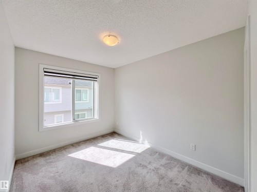 6 11373 12 Avenue, Edmonton, AB - Indoor Photo Showing Other Room