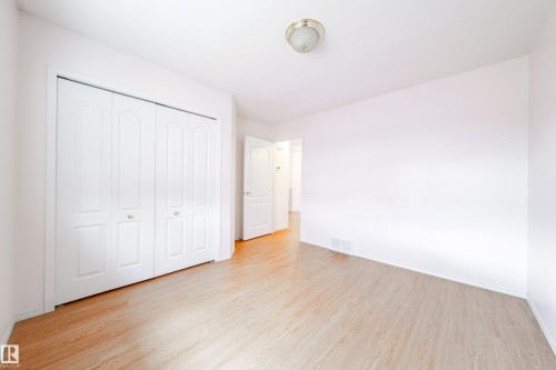 Bright interior space featuring light wood-finish flooring - 120 13320 124 Street Nw, Edmonton, AB 
