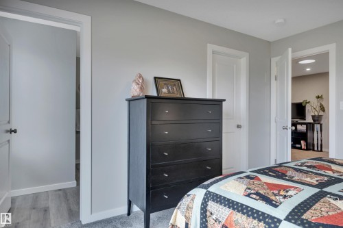 Light grey walls paired with white trim throughout - 157 Larch Crescent, Leduc, AB 