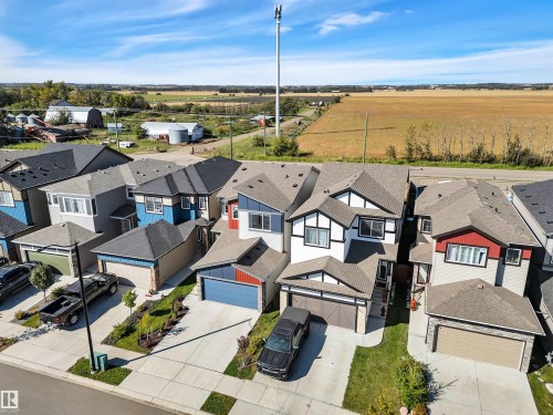 Contemporary residential architecture with varied exterior finishes - 157 Larch Crescent, Leduc, AB 