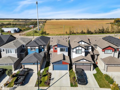 Modern residential architecture with varied facade treatments - 157 Larch Crescent, Leduc, AB 