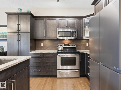 112 89 Rue Monette, Beaumont, AB - Indoor Photo Showing Kitchen With Stainless Steel Kitchen With Upgraded Kitchen