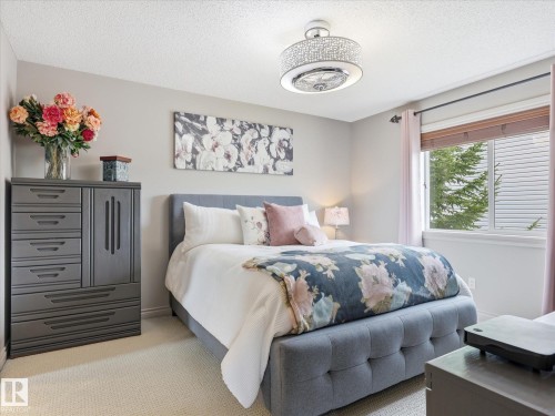 112 89 Rue Monette, Beaumont, AB - Indoor Photo Showing Bedroom