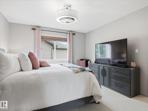 112 89 Rue Monette, Beaumont, AB - Indoor Photo Showing Bedroom