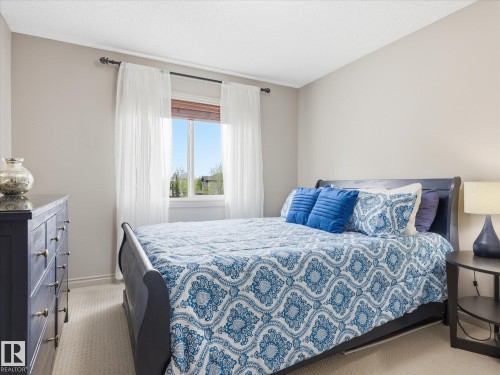 112 89 Rue Monette, Beaumont, AB - Indoor Photo Showing Bedroom
