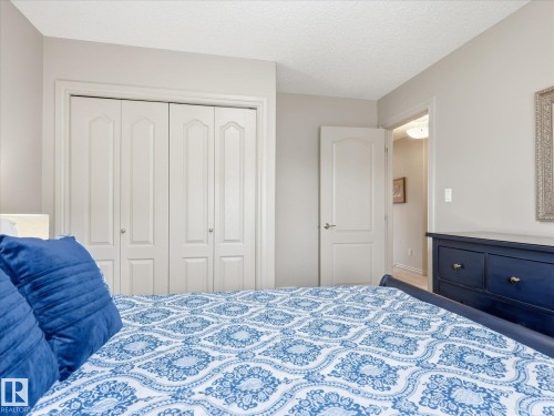 112 89 Rue Monette, Beaumont, AB - Indoor Photo Showing Bedroom