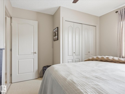 112 89 Rue Monette, Beaumont, AB - Indoor Photo Showing Bedroom