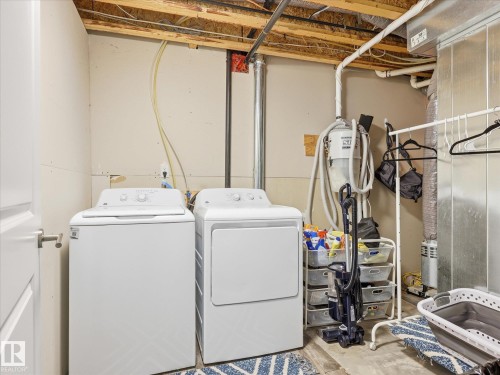 112 89 Rue Monette, Beaumont, AB - Indoor Photo Showing Laundry Room