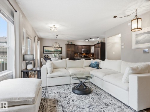 112 89 Rue Monette, Beaumont, AB - Indoor Photo Showing Living Room