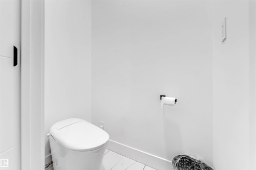 Contemporary toilet featuring a sleek design - 208 33 Street, Edmonton, AB 