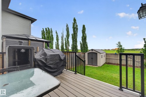 Spacious composite deck with black metal railings - 74 Santana Crescent, Fort Saskatchewan, AB 