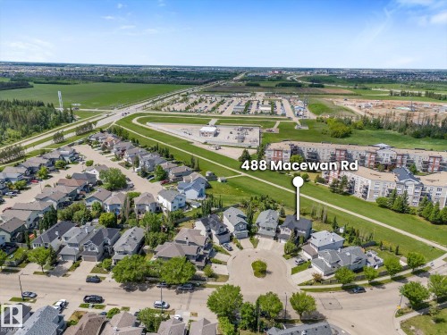 Residential development featuring numerous single-family homes and multi-story buildings - 488 Macewan Road, Edmonton, AB 