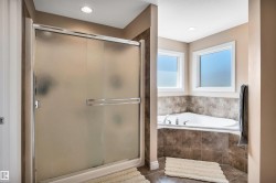 Frosted glass shower enclosure with chrome hardware - 